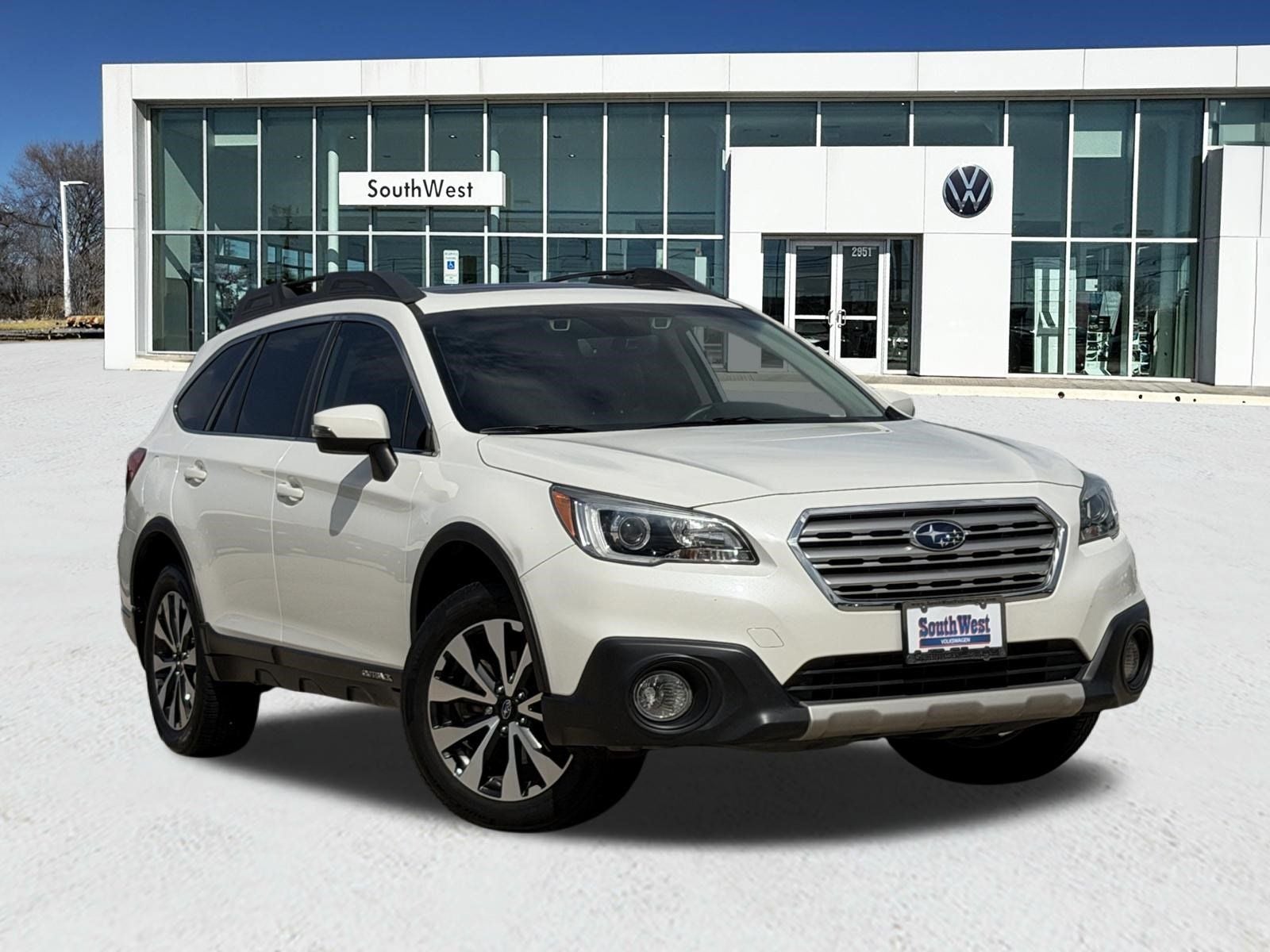 2017 Subaru Outback 2.5i Limited in Crystal White Pearl — front three-quarter view