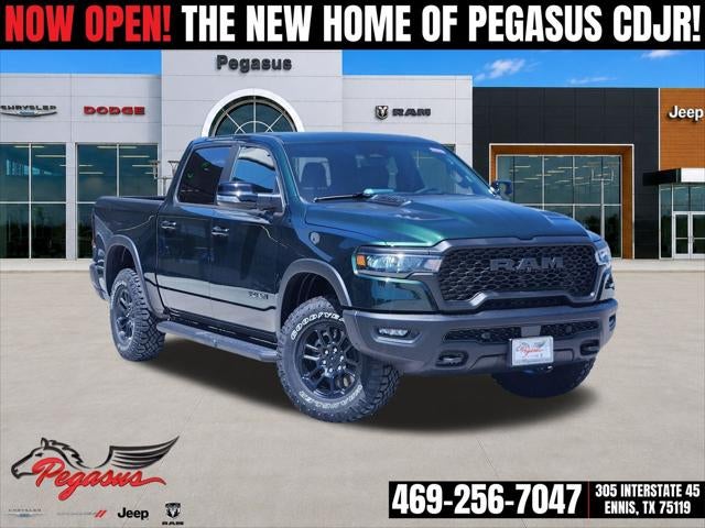 2026 RAM Ram 1500 RAM 1500 REBEL CREW CAB 4X4 5'7' BOX in Serrano-Green Metallic Exterior Paint — front three-quarter view