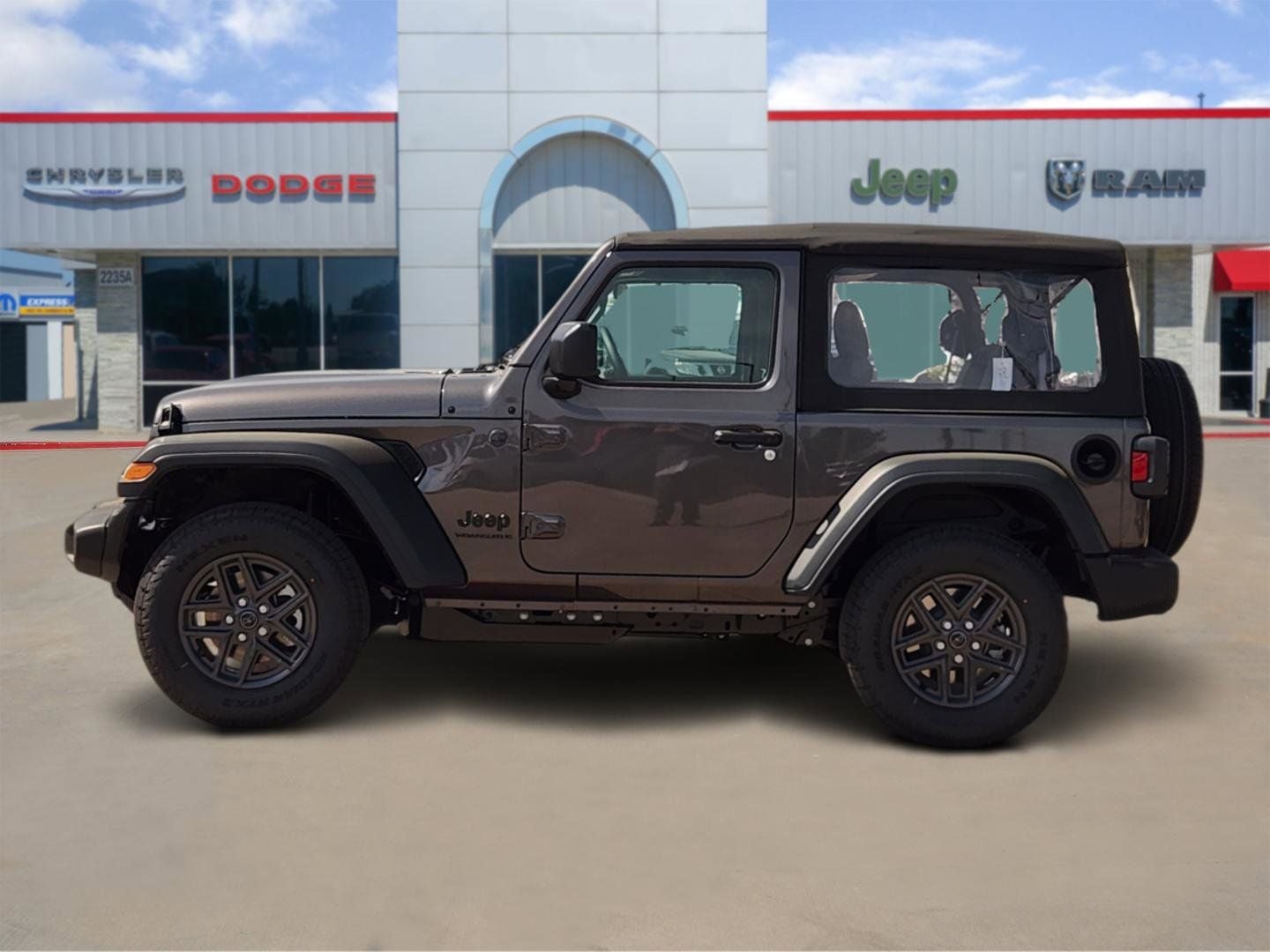 2026 Jeep Wrangler — rear three-quarter view