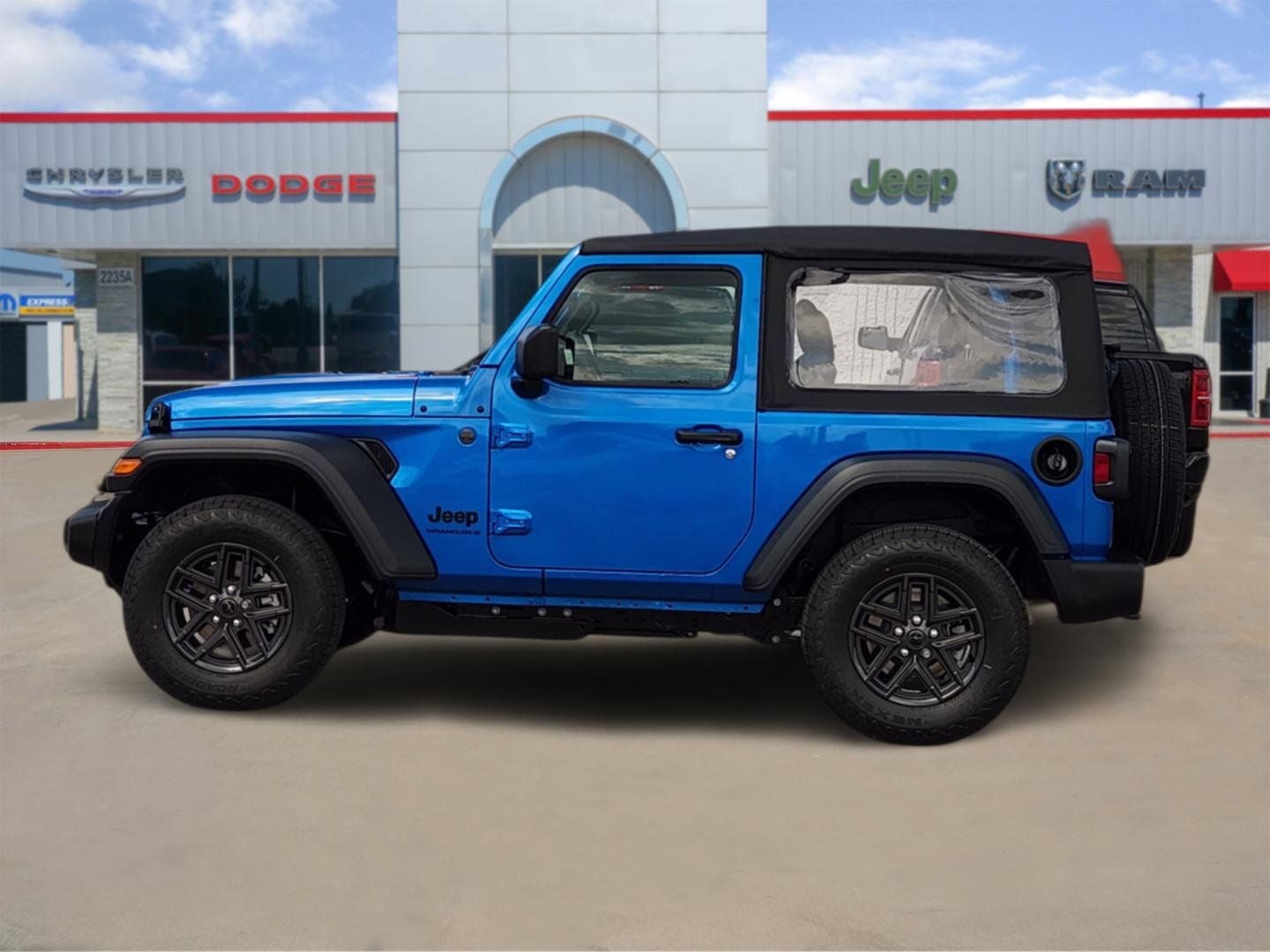 2026 Jeep Wrangler — rear three-quarter view