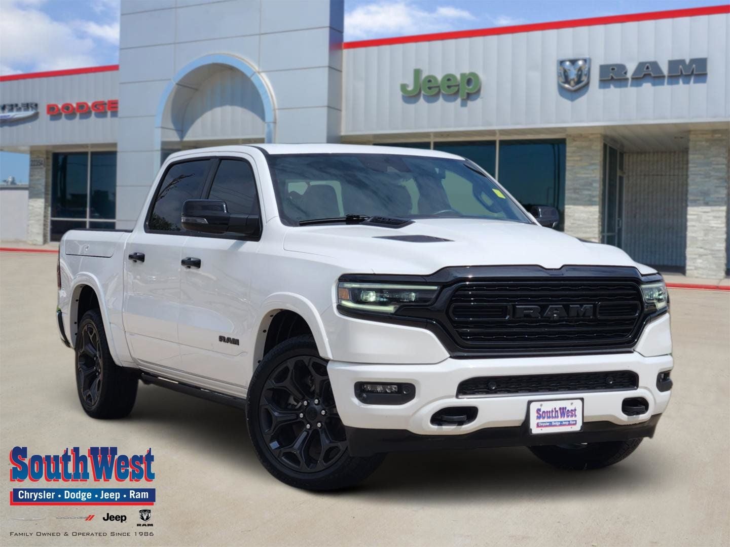2024 RAM Ram 1500 Limited Crew Cab 4x4 5'7' Box in Bright White Clearcoat — front three-quarter view