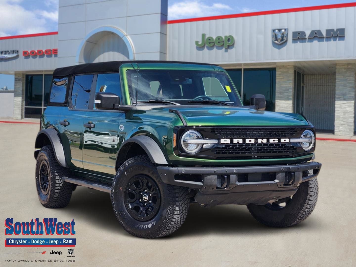 2024 Ford Bronco Wildtrak in Eruption Green Metallic — front three-quarter view