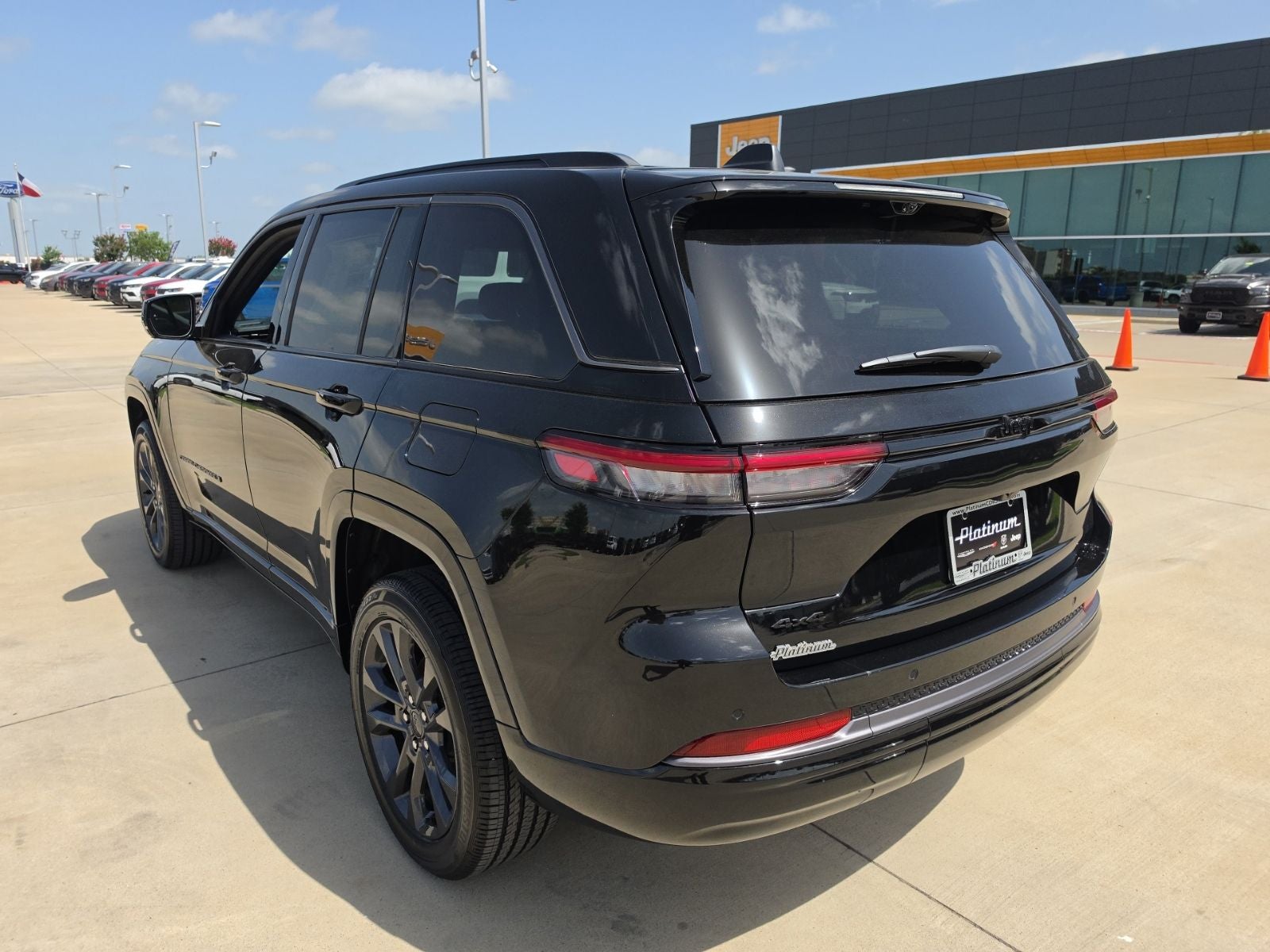 2026 Jeep Grand Cherokee — rear three-quarter view