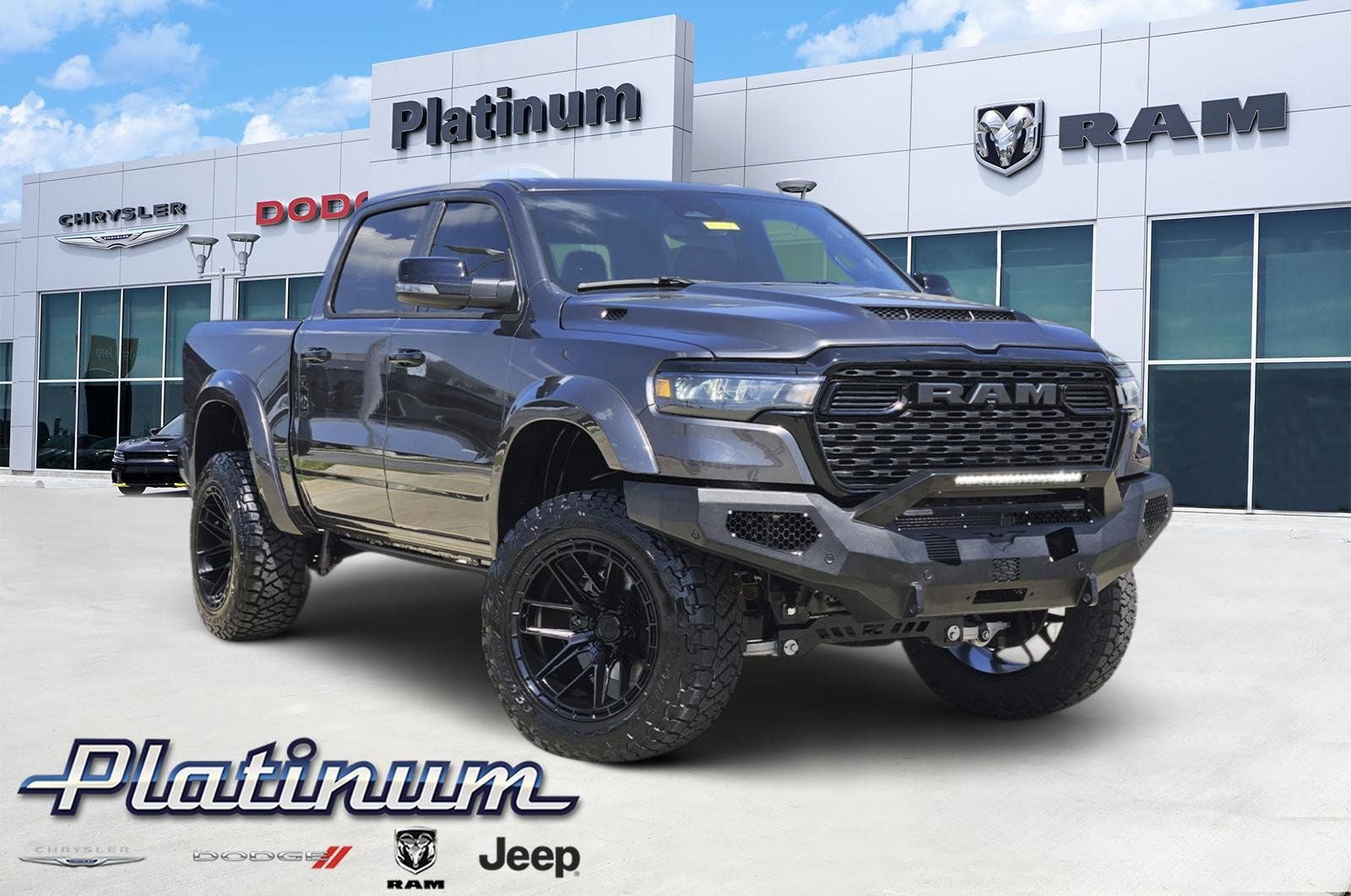 2025 RAM Ram 1500 RAM 1500 BIG HORN CREW CAB 4X4 5'7' BOX in Granite Crystal Metallic Clear-Coat Exterior Paint — front three-quarter view