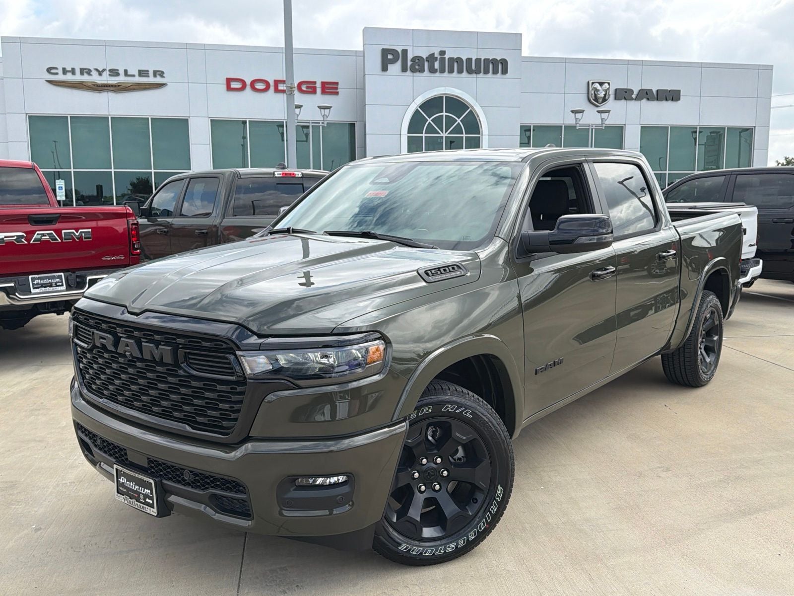 2026 RAM Ram 1500 RAM 1500 LONE STAR CREW CAB 4X4 5'7' BOX in Tank Exterior Paint — front three-quarter view