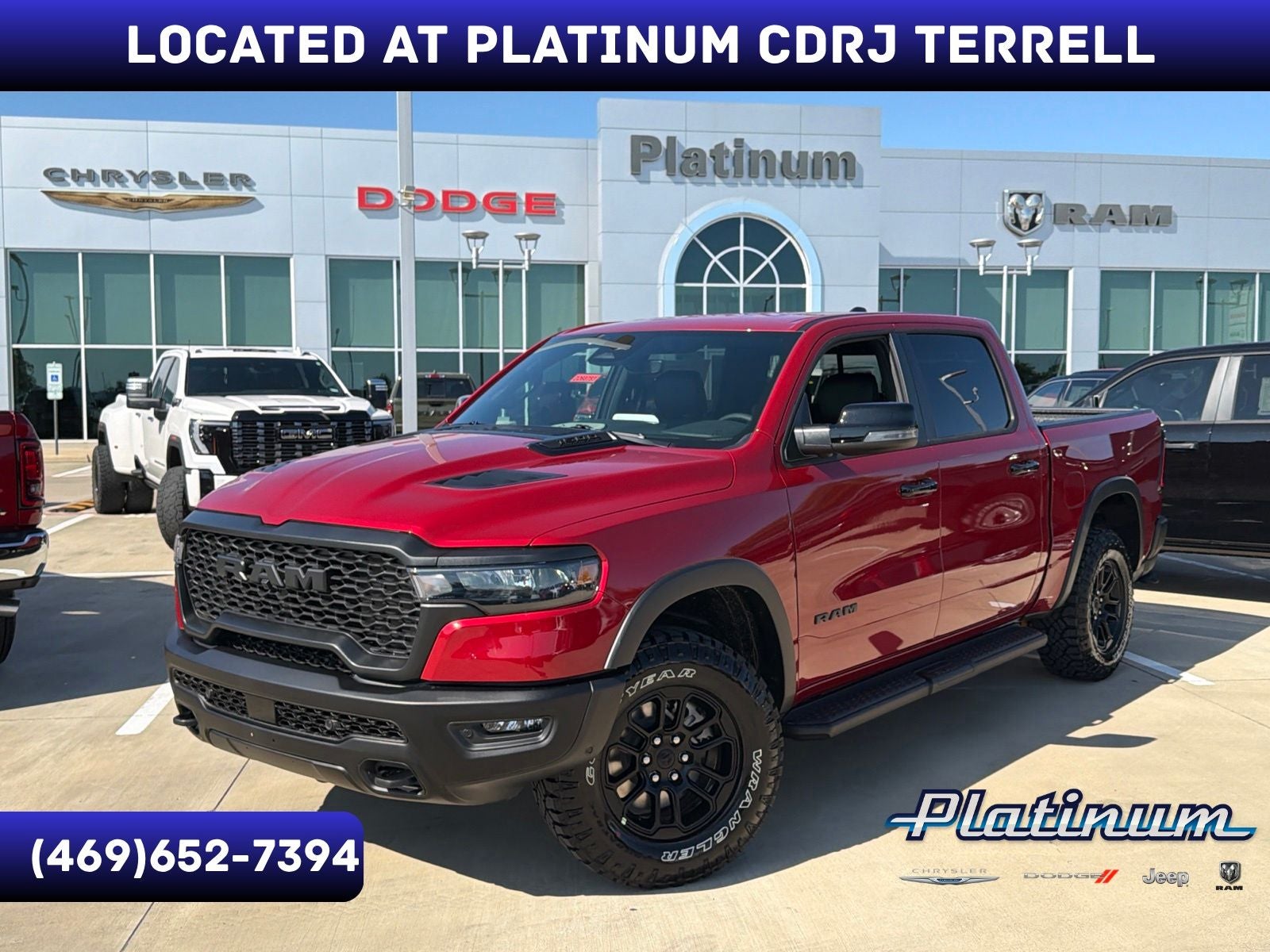 2026 RAM Ram 1500 RAM 1500 REBEL CREW CAB 4X4 5'7' BOX in Molten Red Pearl-Coat Exterior Paint — front three-quarter view