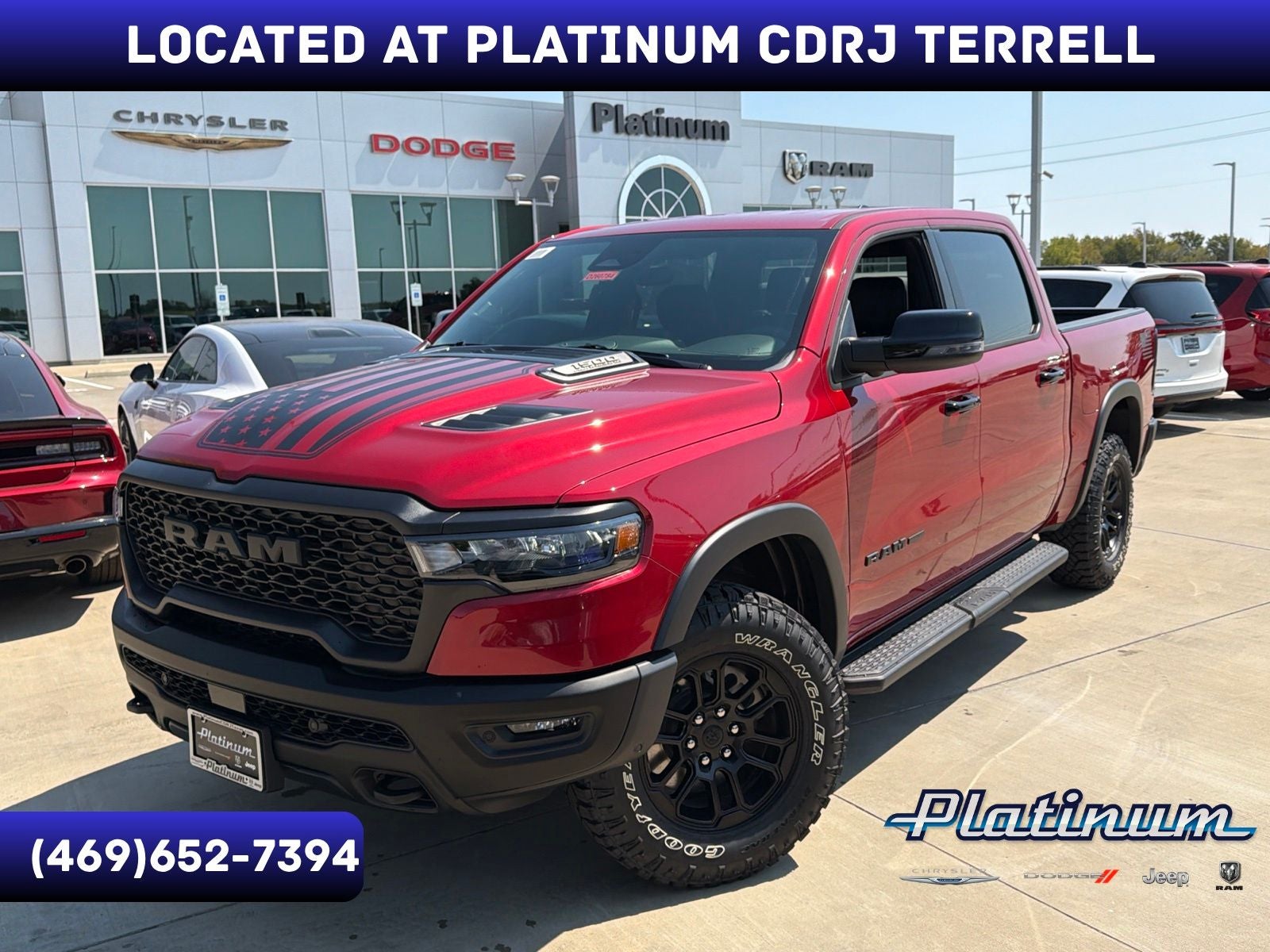 2026 RAM Ram 1500 RAM 1500 REBEL CREW CAB 4X4 5'7' BOX in Molten Red Pearl-Coat Exterior Paint — front three-quarter view