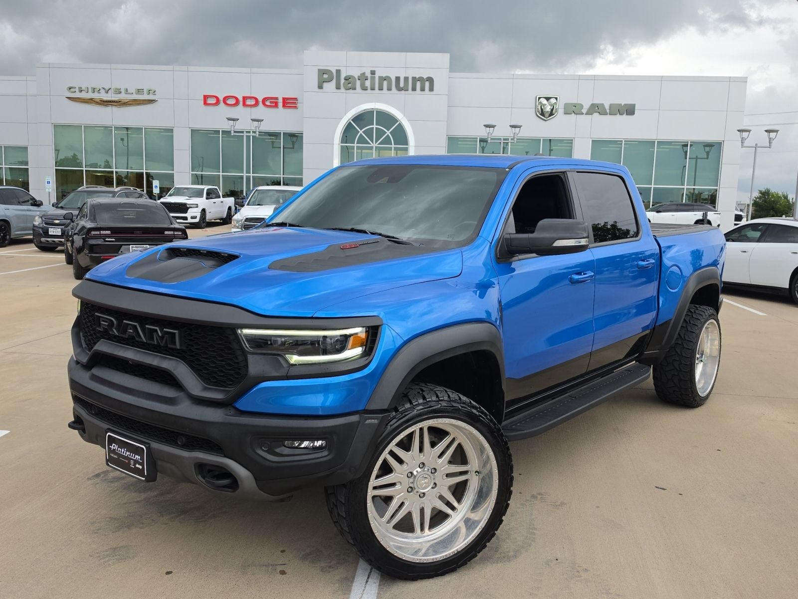 2022 RAM Ram 1500 TRX Crew Cab 4x4 5'7' Box in Hydro Blue Pearlcoat — front three-quarter view