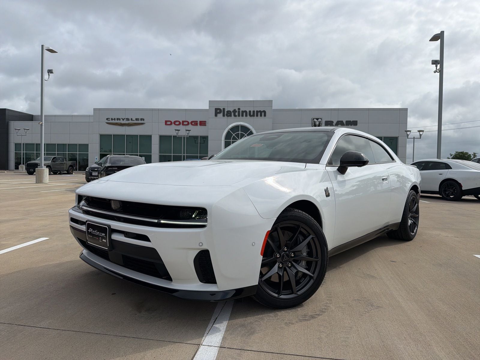 2026 Dodge Charger CHARGER SCAT PACK PLUS 2-DOOR AWD in White Knuckle Exterior Paint — front three-quarter view