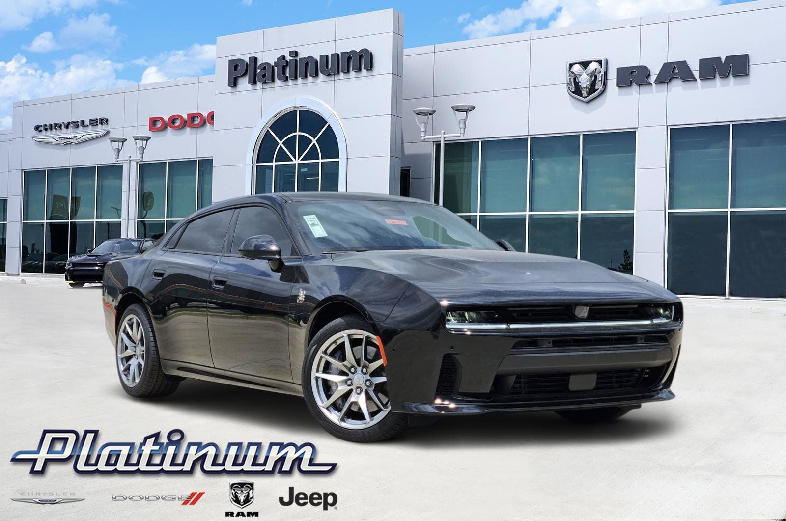 2026 Dodge Charger CHARGER SCAT PACK PLUS 4-DOOR AWD in Diamond Black Crystal Pearlcoat — front three-quarter view