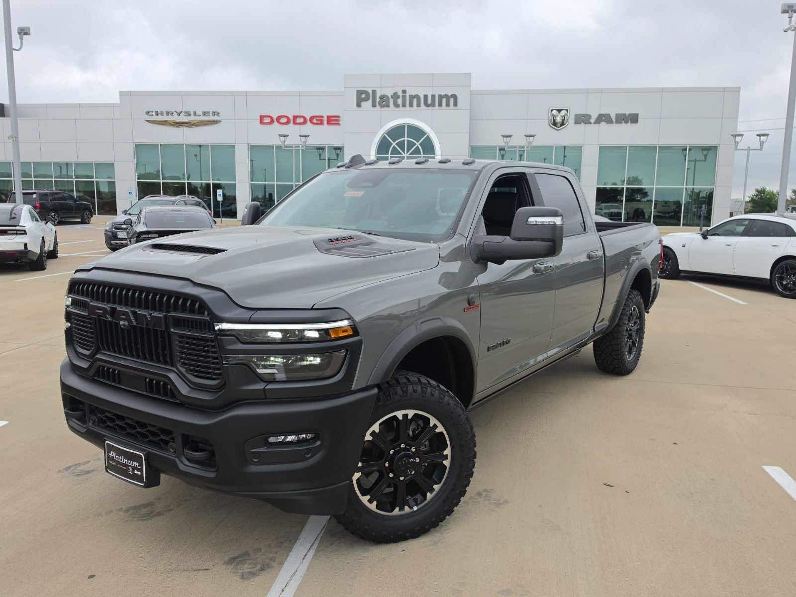 2026 RAM Ram 2500 RAM 2500 REBEL CREW CAB 4X4 6'4' BOX in Ceramic Gray Clear-Coat Exterior Paint — front three-quarter view