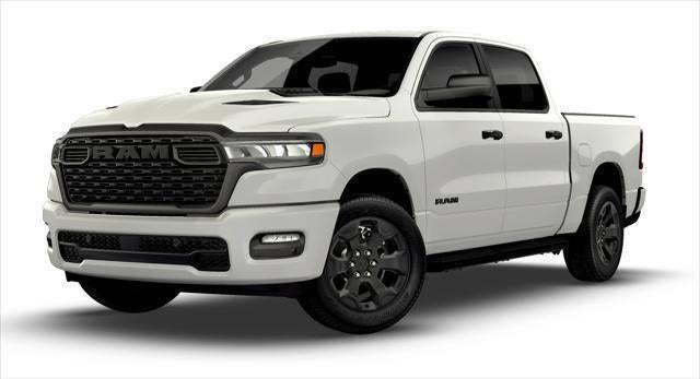 2026 RAM Ram 1500 RAM 1500 EXPRESS CREW CAB 4X4 5'7' BOX in Bright White Clear-Coat Exterior Paint — front three-quarter view