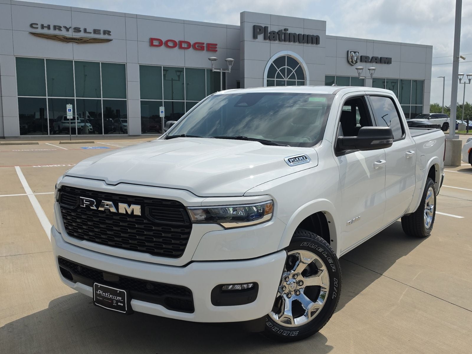 2026 RAM Ram 1500 RAM 1500 LONE STAR CREW CAB 4X4 5'7' BOX in Bright White Clear-Coat Exterior Paint — front three-quarter view