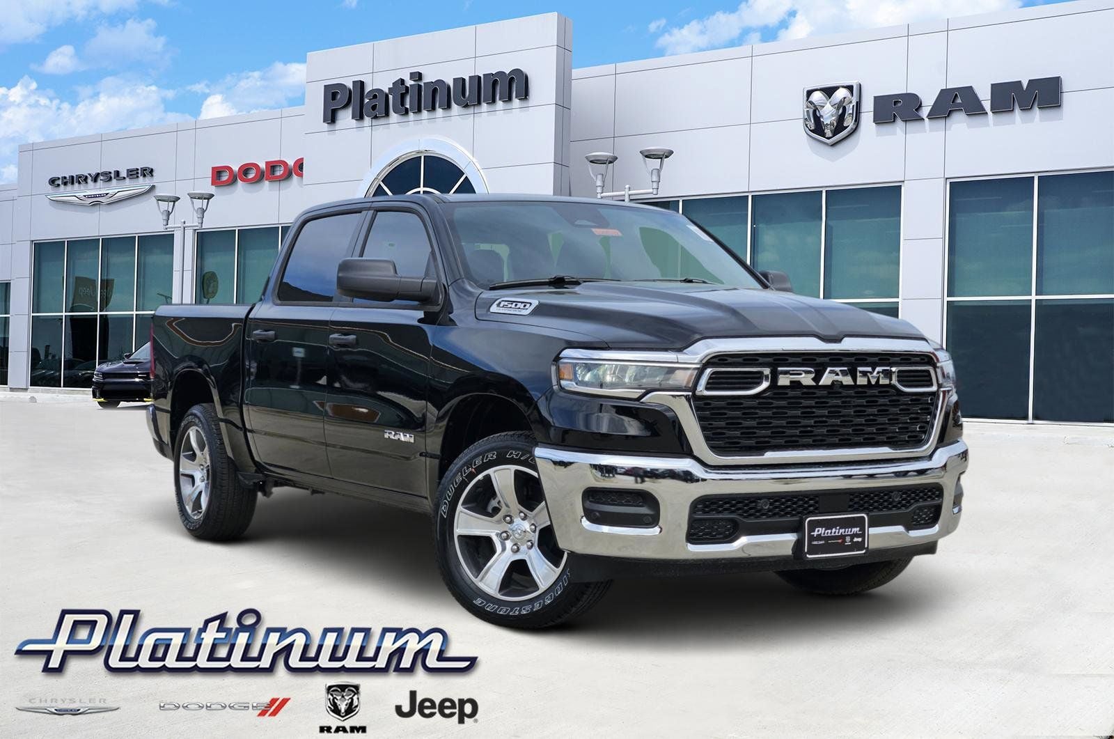 2026 RAM Ram 1500 RAM 1500 TRADESMAN CREW CAB 4X4 5'7' BOX in Diamond Black Crystal Pearl-Coat Exterior Paint — front three-quarter view