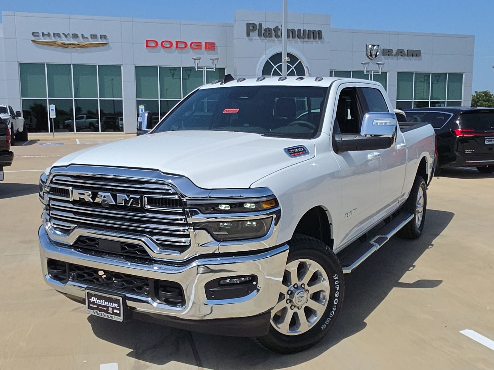 2026 RAM Ram 2500 RAM 2500 LARAMIE CREW CAB 4X4 6'4' BOX in Bright White Clear-Coat Exterior Paint — front three-quarter view