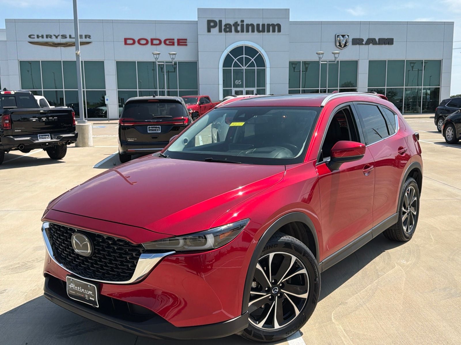 2022 Mazda Mazda CX-5 2.5 S Premium Plus in Soul Red Crystal Metallic — front three-quarter view