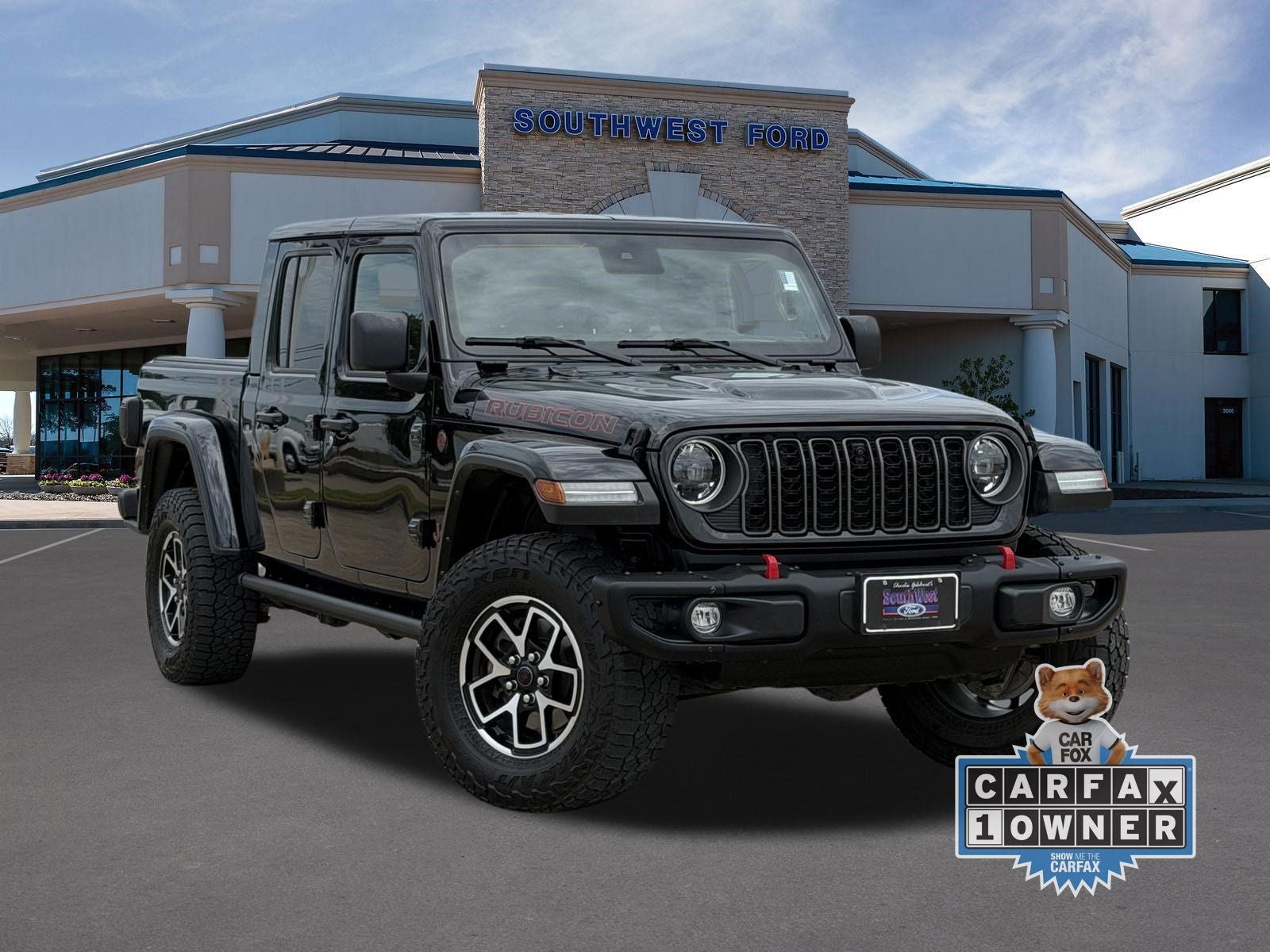 2024 Jeep Gladiator Rubicon in Black Clearcoat — front three-quarter view