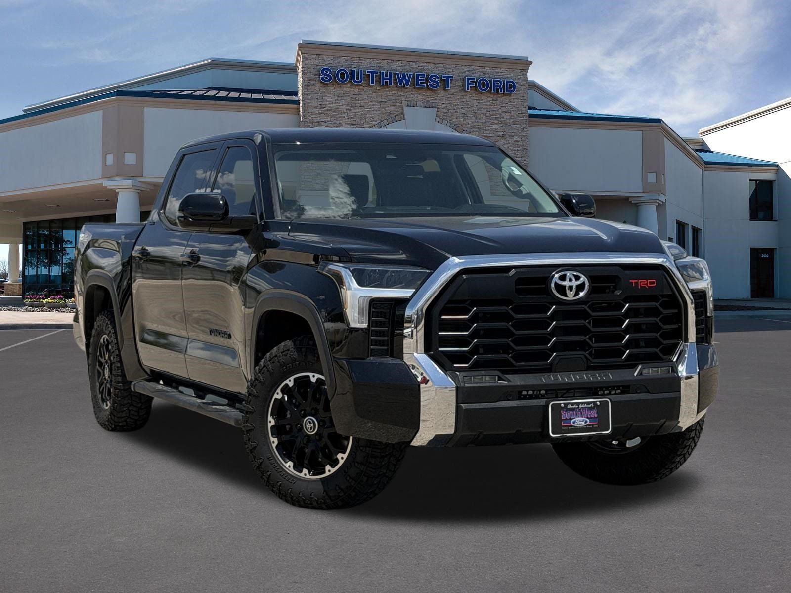 2023 Toyota Tundra SR5 in Midnight Black Metallic — front three-quarter view