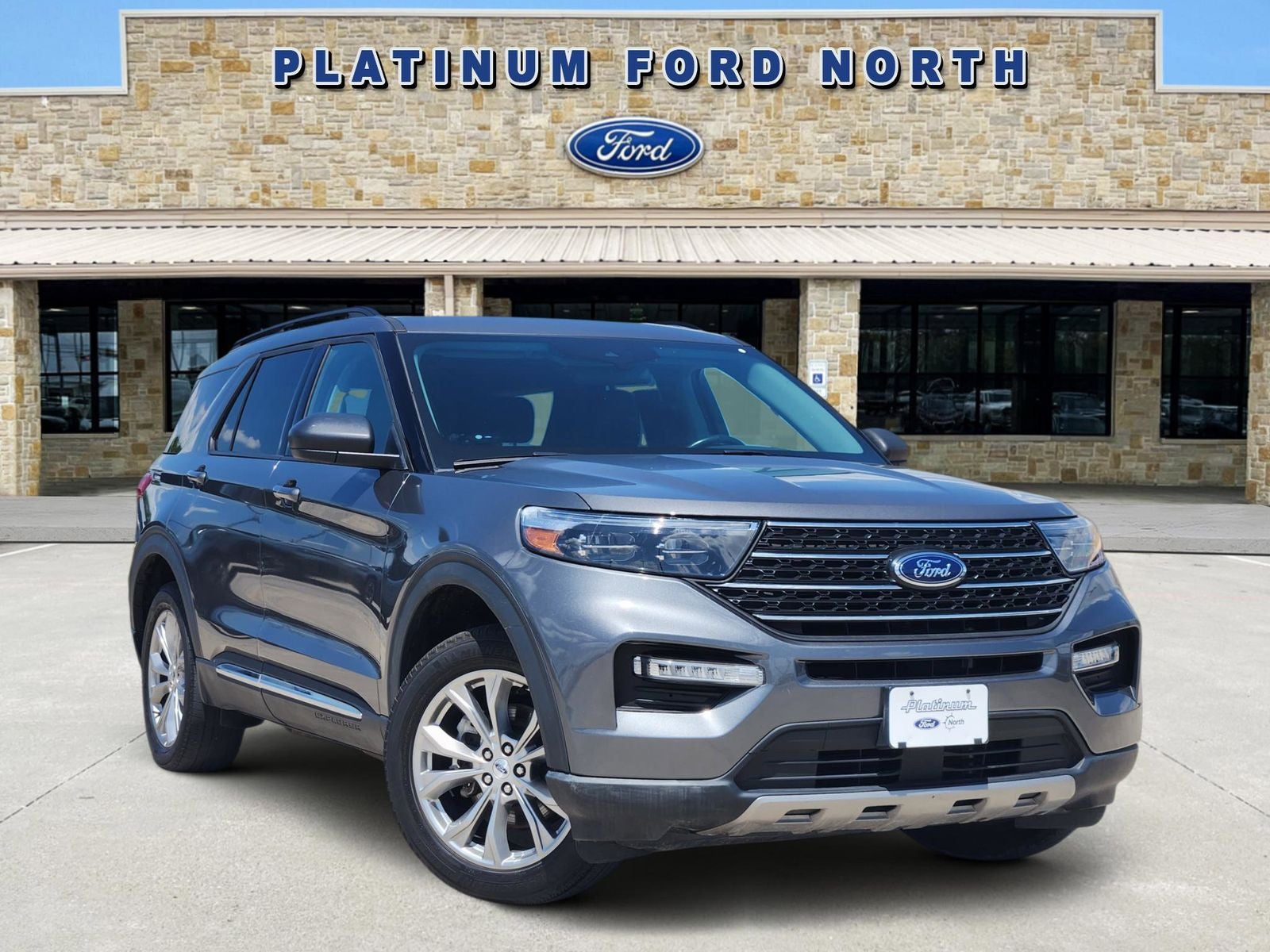 2022 Ford Explorer XLT in Gray Metallic — front three-quarter view