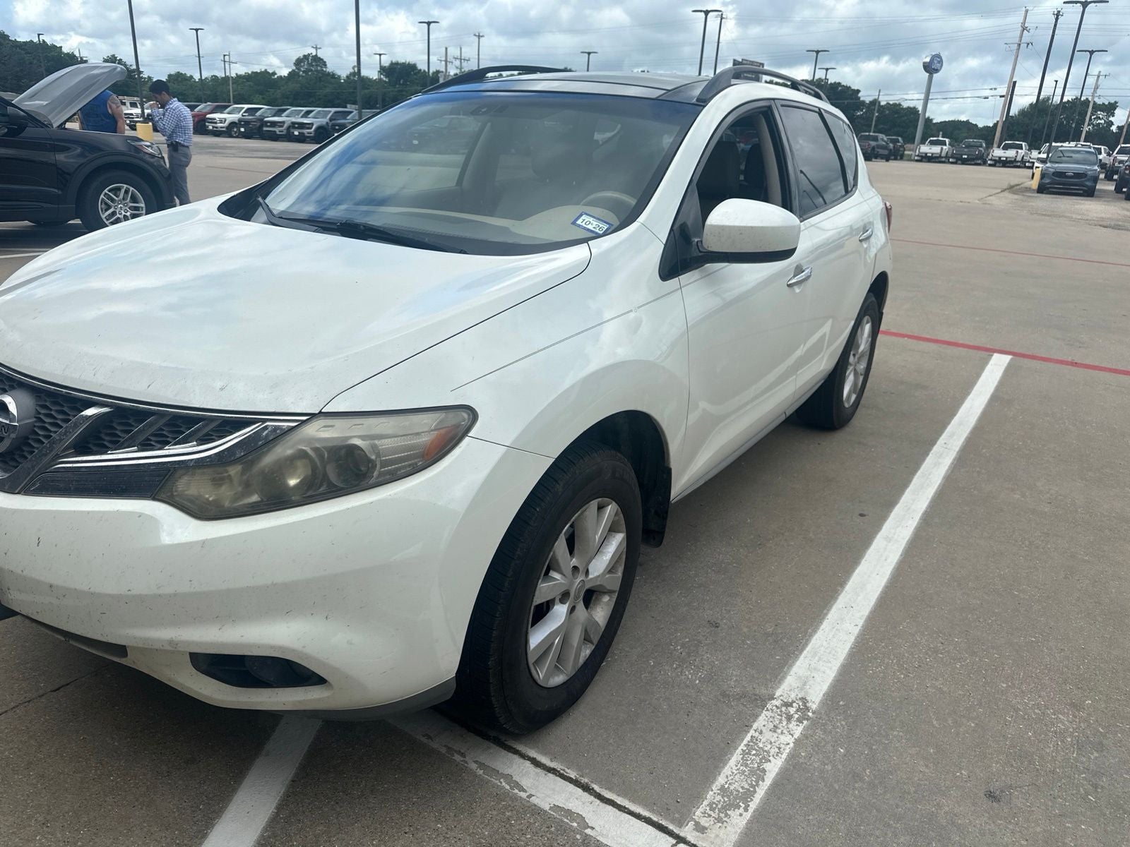 2011 Nissan Murano SL in Glacier Pearl Clearcoat — front three-quarter view