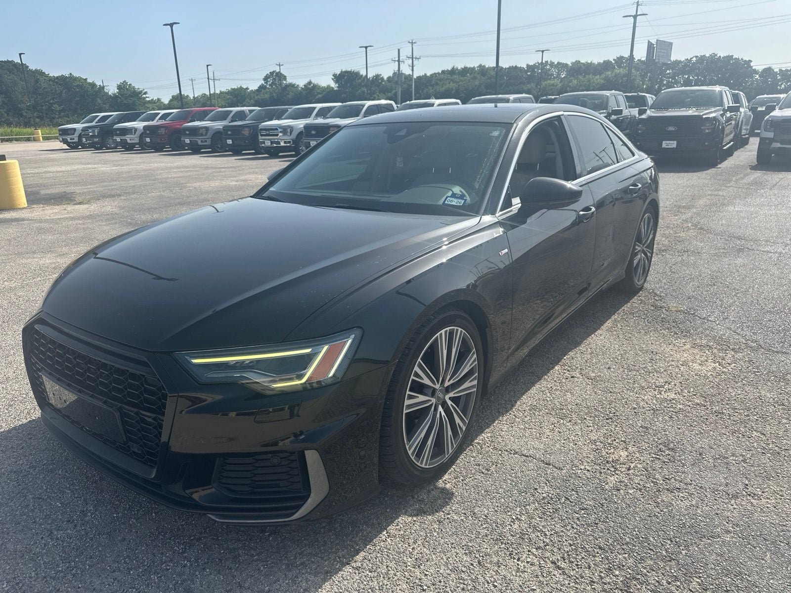 2019 Audi A6 3.0T Premium Plus quattro in Black Metallic — front three-quarter view