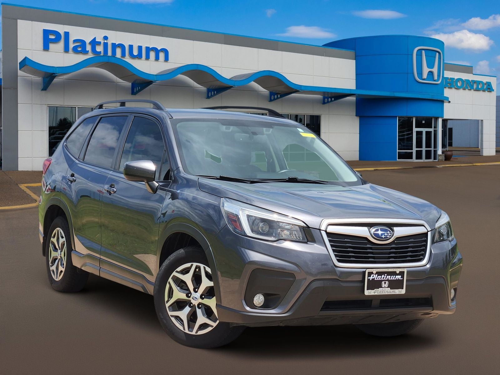2021 Subaru Forester Premium in Magnetite Gray Metallic — front three-quarter view