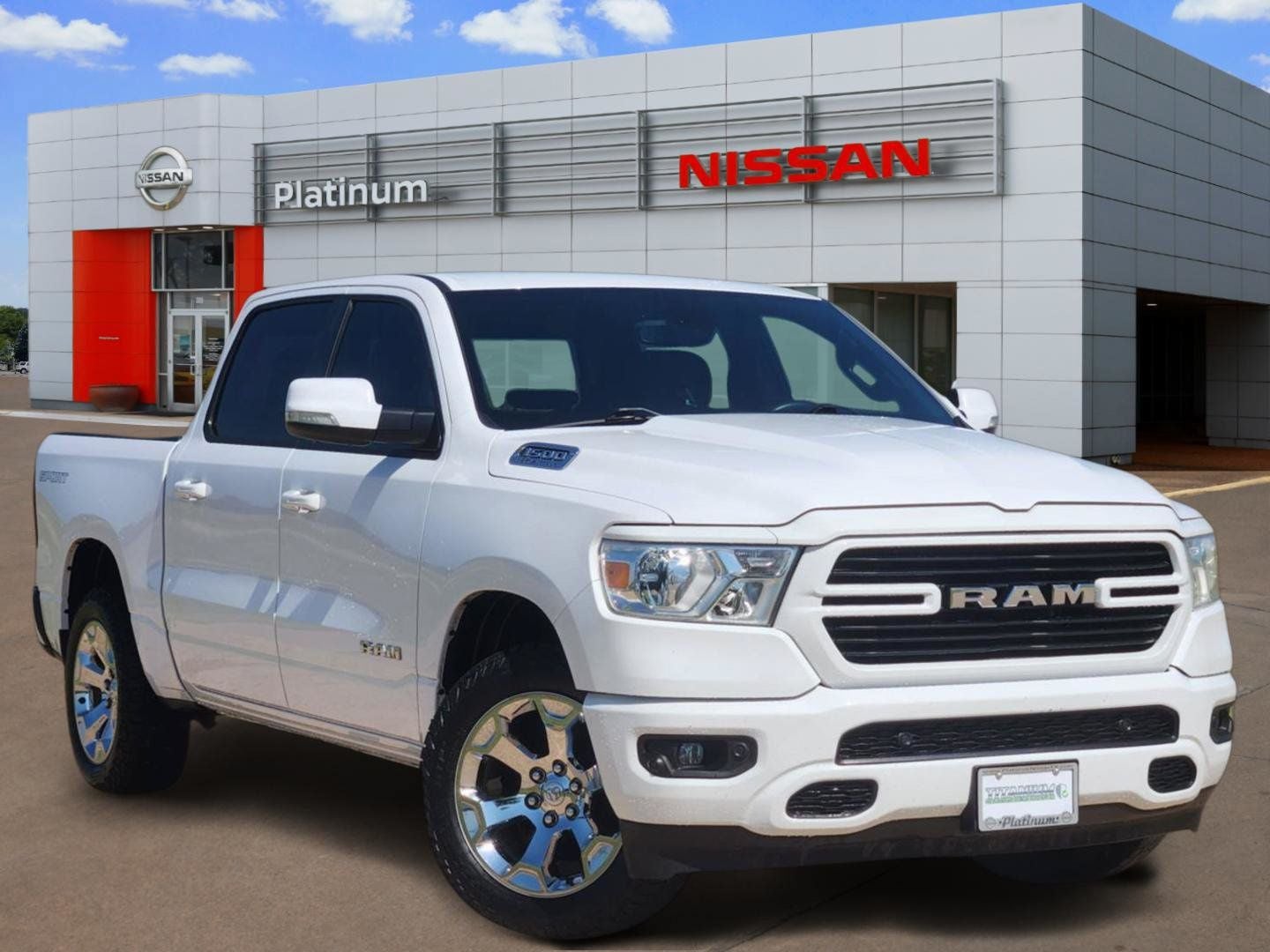 2021 RAM 1500 Big Horn/Lone Star in Bright White Clearcoat — front three-quarter view