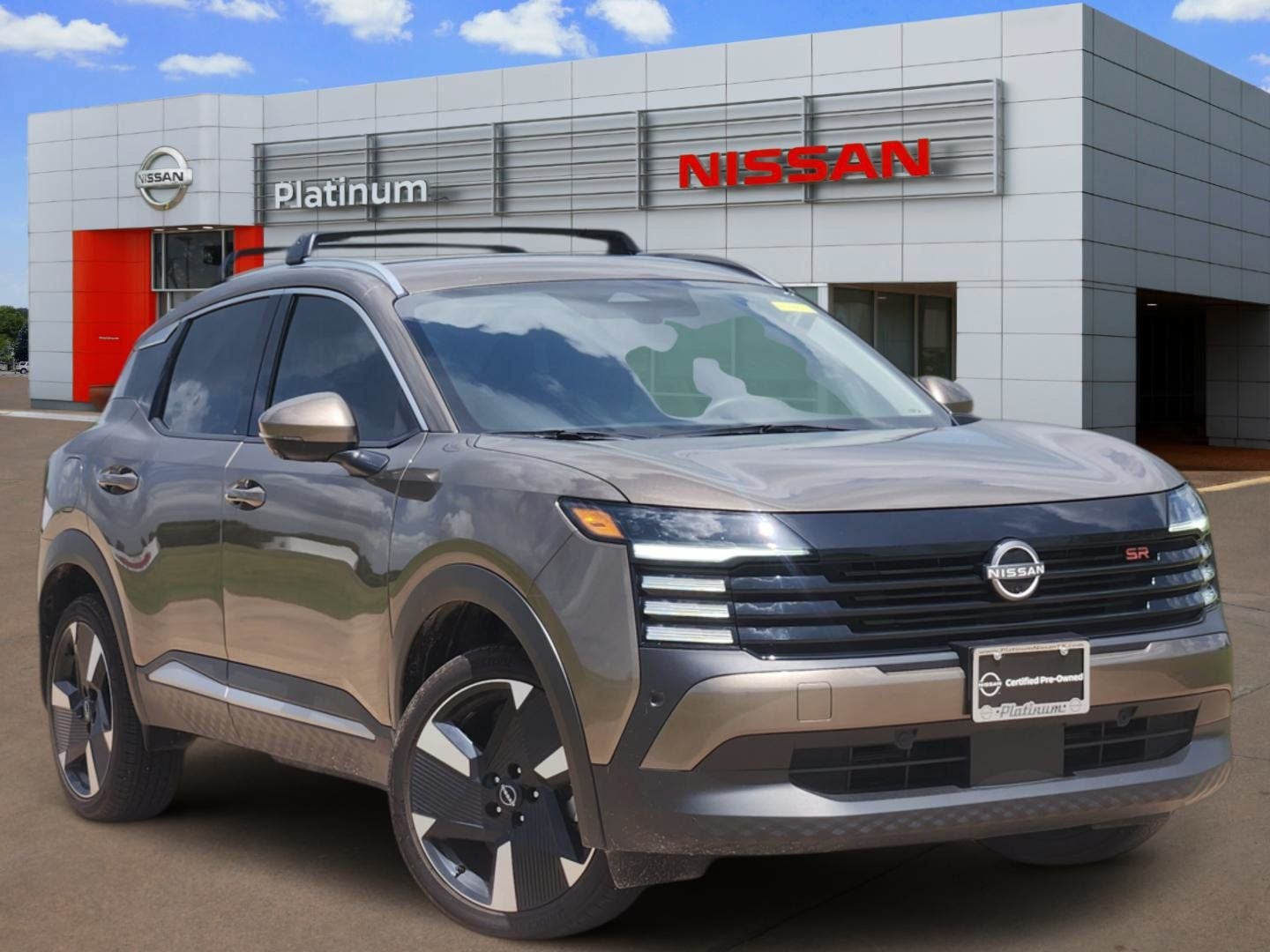 2025 Nissan Kicks SR in Canyon Bronze Metallic — front three-quarter view