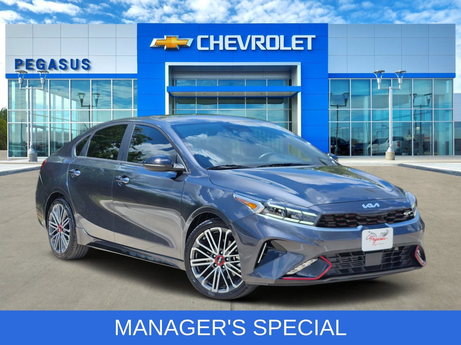 2024 Kia Forte GT in Gray — front three-quarter view