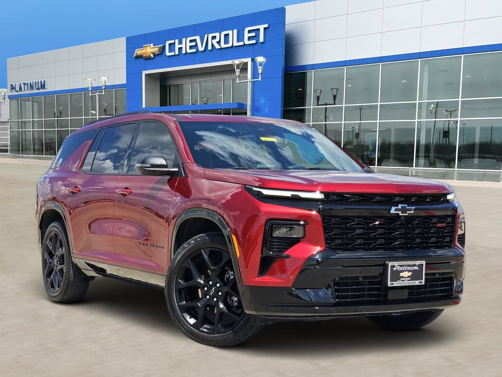 2024 Chevrolet Traverse RS in Radiant Red Tintcoat — front three-quarter view