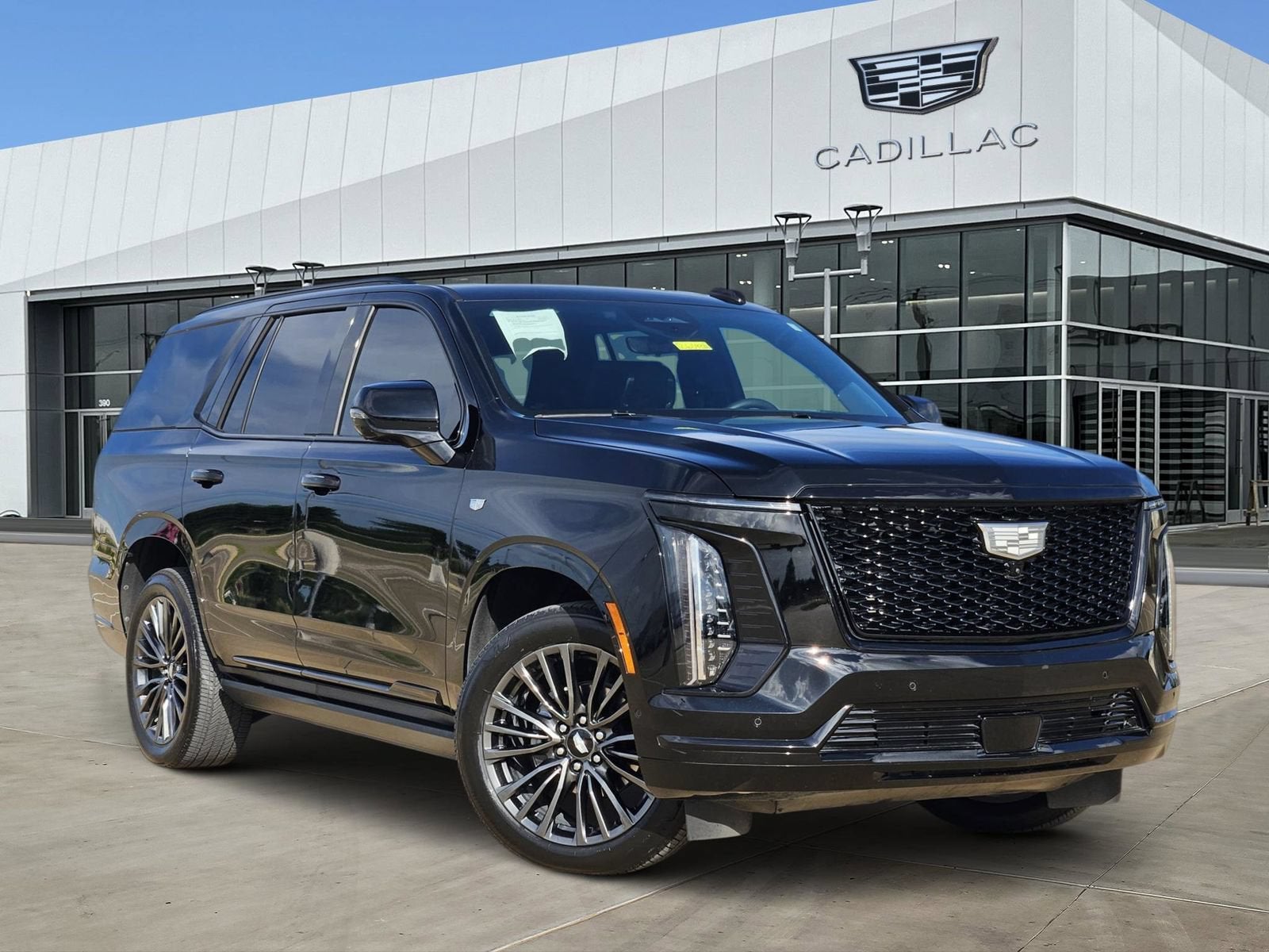 2025 Cadillac Escalade Sport Platinum in Black Raven — front three-quarter view