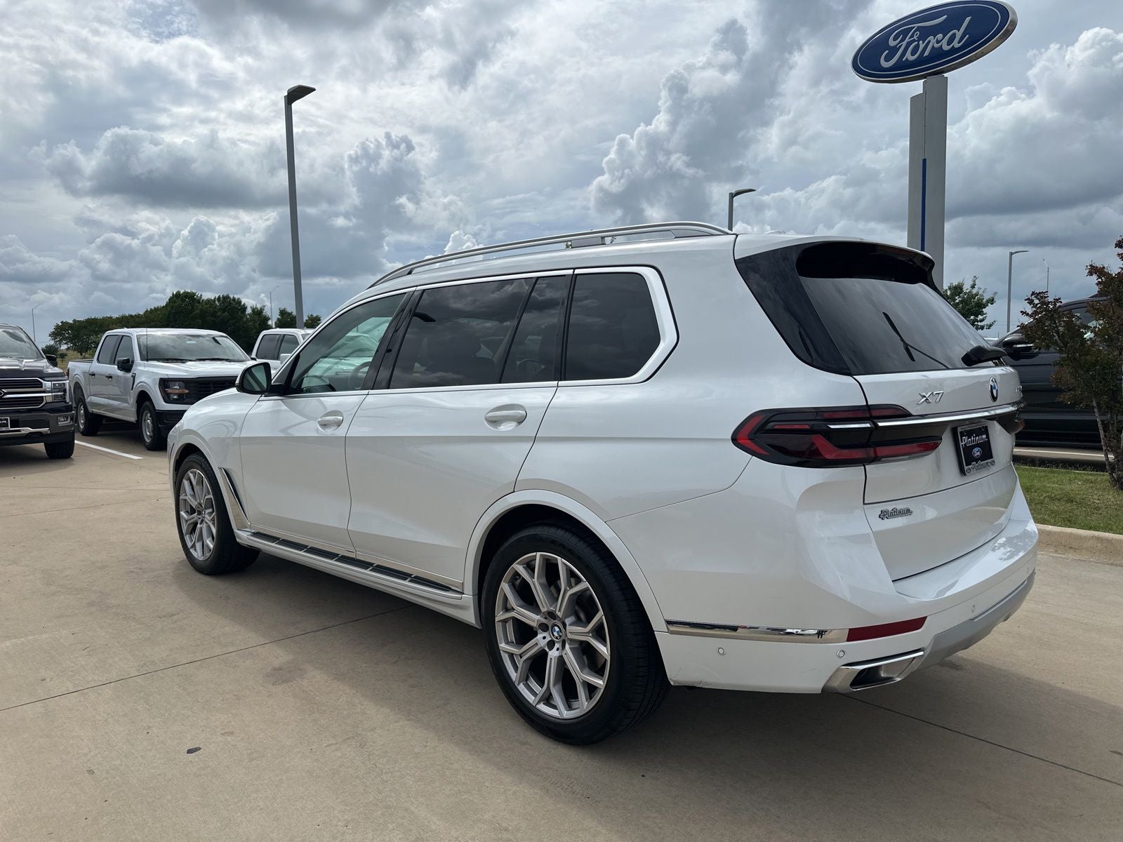 2025 BMW X7 — rear three-quarter view